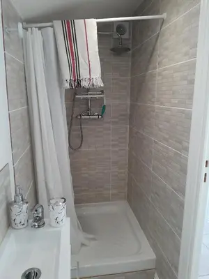 Salle de bains dans l'établissement Les Lilas