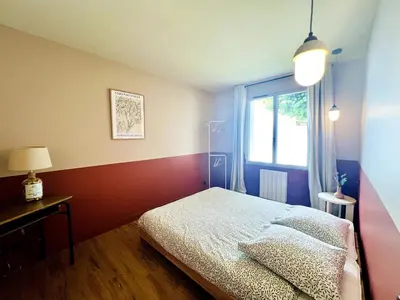 Un ou plusieurs lits dans un hébergement de l'établissement L'Aparté - Jardin privatif
