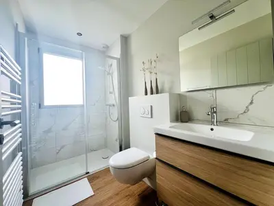 Salle de bains dans l'établissement L'Aparté - Jardin privatif