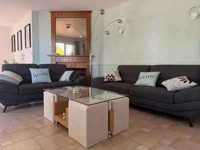 Coin salon dans l'établissement Les Murmures du Thouet