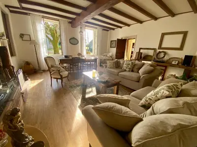 Coin salon dans l'établissement Le Domaine des Tilleuls