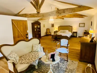 Coin salon dans l'établissement Le Domaine des Tilleuls