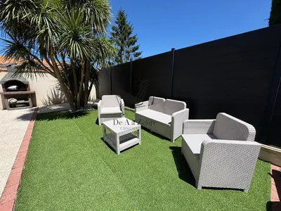 Coin salon dans l'établissement ARISTIDE 8 - Agréable maison idéalement située
