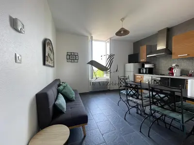Cuisine ou kitchenette dans l'établissement ARISTIDE 4 - Appartement idéalement située