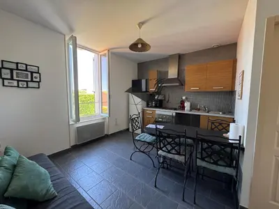 Cuisine ou kitchenette dans l'établissement ARISTIDE 4 - Appartement idéalement située