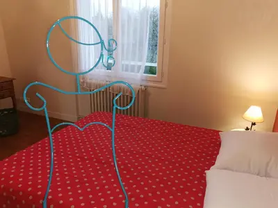 Un ou plusieurs lits dans un hébergement de l'établissement Authentique Gîte 1950 Poitiers Futuroscope Aquascope, 1à9prsn, 3 Pkg, 3 étoiles à 6prsn et 3 appoints Eco-Responsable