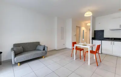 Cuisine ou kitchenette dans l'établissement Appartement Proche Plage