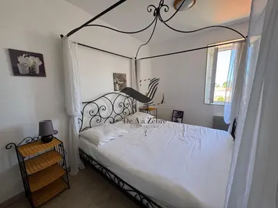 Un ou plusieurs lits dans un hébergement de l'établissement ARISTIDE 6 - Appartement idéalement situé