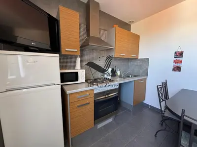 Cuisine ou kitchenette dans l'établissement ARISTIDE 6 - Appartement idéalement situé