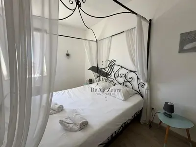 Un ou plusieurs lits dans un hébergement de l'établissement ARISTIDE 7 - Appartement idéalement situé