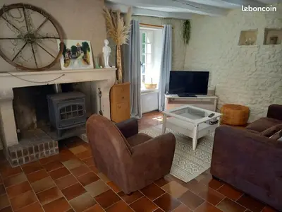 Télévision ou salle de divertissement dans l'établissement Gîte du vieux puits