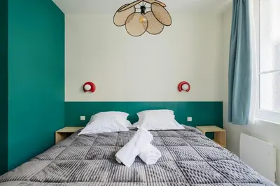 Un ou plusieurs lits dans un hébergement de l'établissement Appartement 2ch Tout Neuf à Deux Pas du Vieux Port