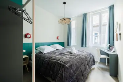 Un ou plusieurs lits dans un hébergement de l'établissement Appartement 2ch Tout Neuf à Deux Pas du Vieux Port