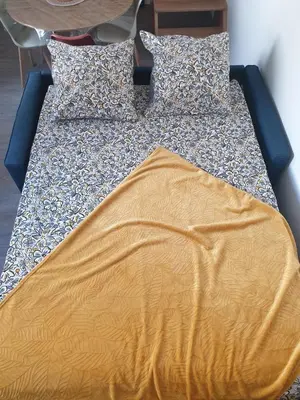Un ou plusieurs lits dans un hébergement de l'établissement Le Patio du 71 D