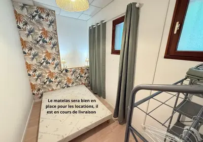 Un ou plusieurs lits dans un hébergement de l'établissement House 15 min from Futuroscope