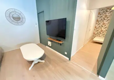 Télévision ou salle de divertissement dans l'établissement House 15 min from Futuroscope