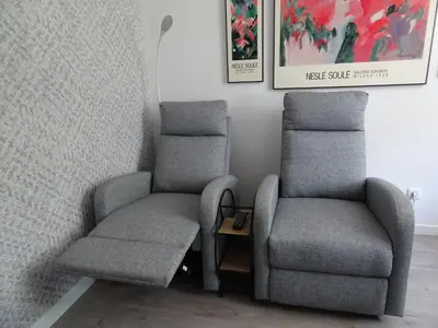 Coin salon dans l'établissement Le jardin de Brigitte