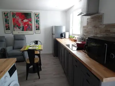Cuisine ou kitchenette dans l'établissement Le jardin de Brigitte