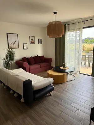 Coin salon dans l'établissement Maison neuve