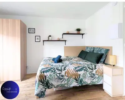 Un ou plusieurs lits dans un hébergement de l'établissement L'Oasis by Cozylife - Centre Ville