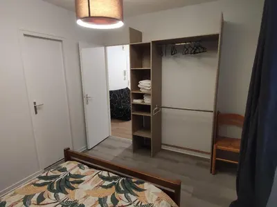Un ou plusieurs lits dans un hébergement de l'établissement Appartement de ville