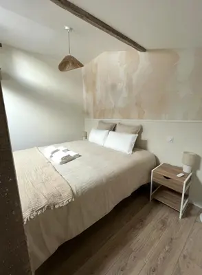 Un ou plusieurs lits dans un hébergement de l'établissement Serenity Appart', Les Clés de l'Espoir, proche Poitiers