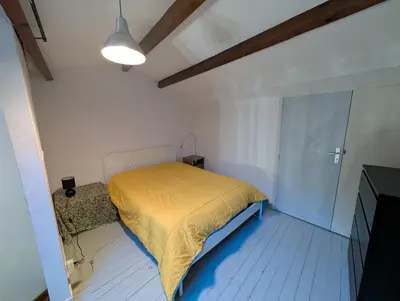 Un ou plusieurs lits dans un hébergement de l'établissement Appartement du Cordouan, lumineux, calme et central a 100m du marché