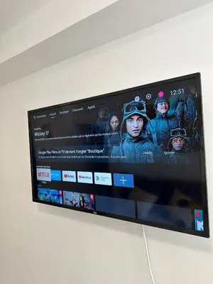 Télévision ou salle de divertissement dans l'établissement Logement 7 parking gratuit