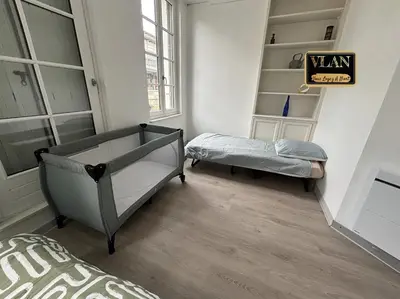 Un ou plusieurs lits dans un hébergement de l'établissement Sur le balcon des halles