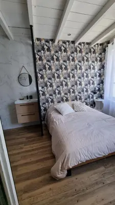 Un ou plusieurs lits dans un hébergement de l'établissement Romantic Cognac Studio