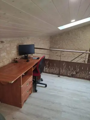 Télévision ou salle de divertissement dans l'établissement Gîte familial Marais Poitevin Les glycines