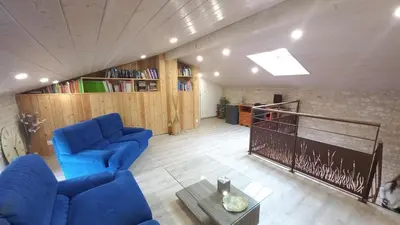 Coin salon dans l'établissement Gîte familial Marais Poitevin Les glycines
