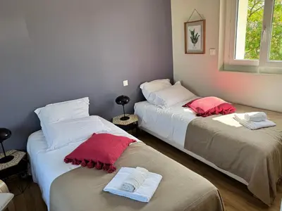 Un ou plusieurs lits dans un hébergement de l'établissement Maison Malabry en hyper centre avec jardin 6 pers