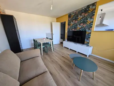 Coin salon dans l'établissement L'appartement de Julien