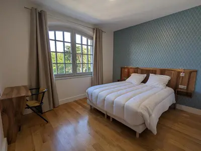 Un ou plusieurs lits dans un hébergement de l'établissement Maison Prunier