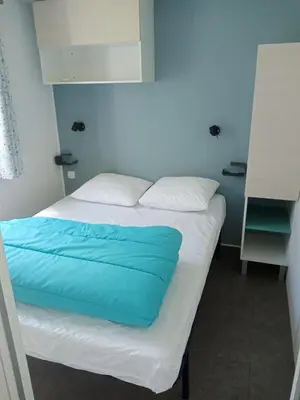 Un ou plusieurs lits dans un hébergement de l'établissement camping ile aux loisirs