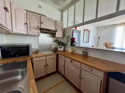 Cuisine ou kitchenette dans l'établissement La Maison D'Isis