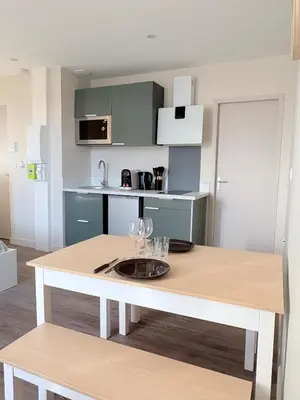 Cuisine ou kitchenette dans l'établissement La Bressuiraise