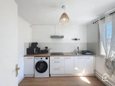 Cuisine ou kitchenette dans l'établissement Le Gardena - Parking - 2 Beds