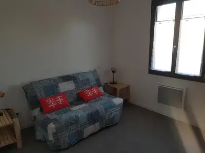 Coin salon dans l'établissement Maison récente pour vacances en Charente-Maritime