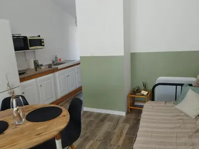 Cuisine ou kitchenette dans l'établissement Studio cosy près de La Rochelle