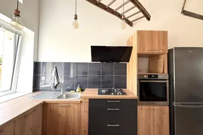 Cuisine ou kitchenette dans l'établissement La Maison de Porcher