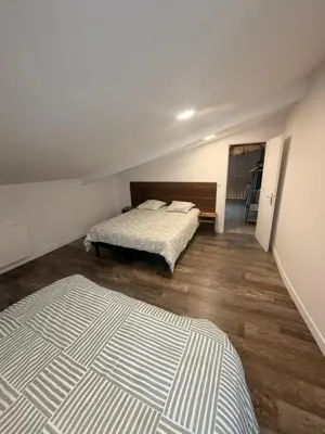 Un ou plusieurs lits dans un hébergement de l'établissement Petite maison chez l habitant