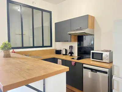 Cuisine ou kitchenette dans l'établissement Magnifique T3 en plein centre ville de Poitiers