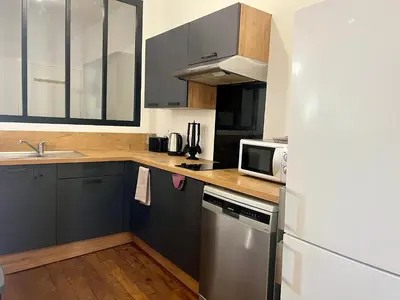 Cuisine ou kitchenette dans l'établissement Magnifique T3 en plein centre ville de Poitiers