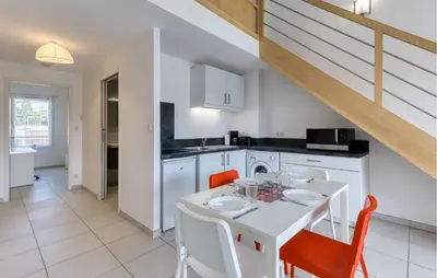 Cuisine ou kitchenette dans l'établissement Appartement Proche Plage