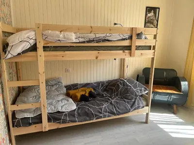 Un ou plusieurs lits dans un hébergement de l'établissement Maison Cosy Retour de plage
