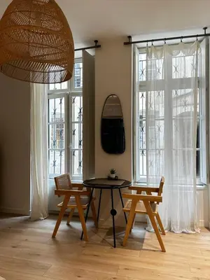 Télévision ou salle de divertissement dans l'établissement Studio élégant
