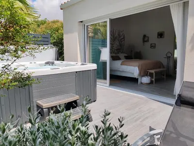 Balcon ou terrasse dans l'établissement Cottage Escale Nature & Sérénité - spa privatif