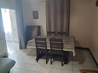 Coin salon dans l'établissement Petite maison de bourg